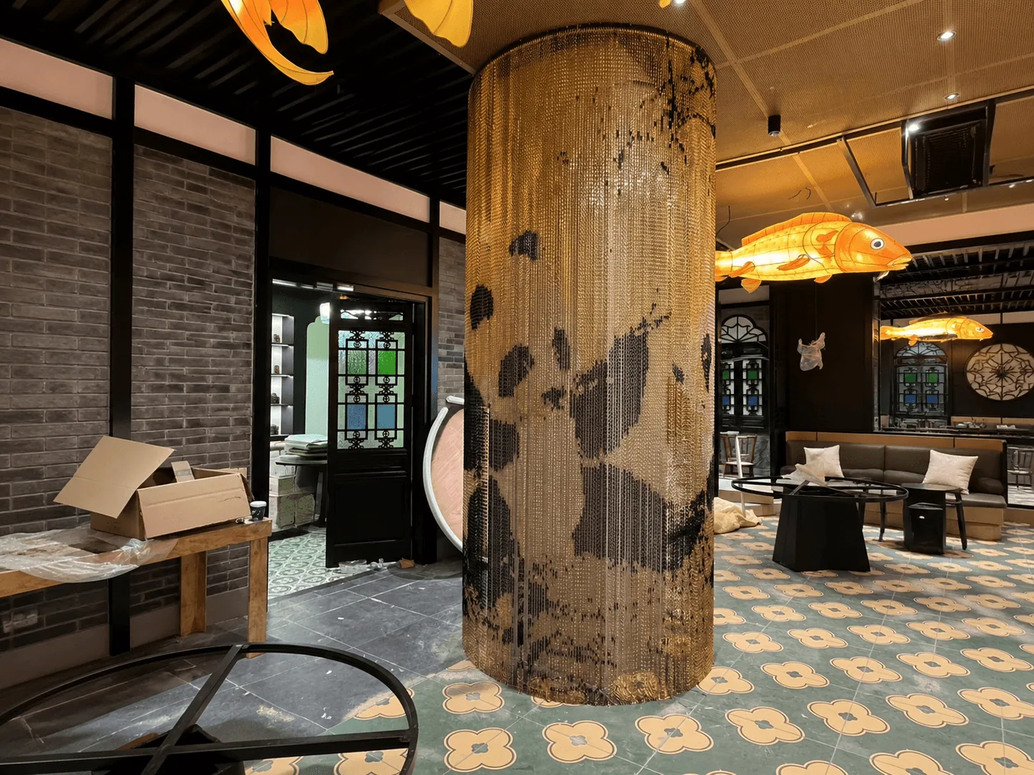 Graphic metal chain curtain build-up integrated with mixed interior materials