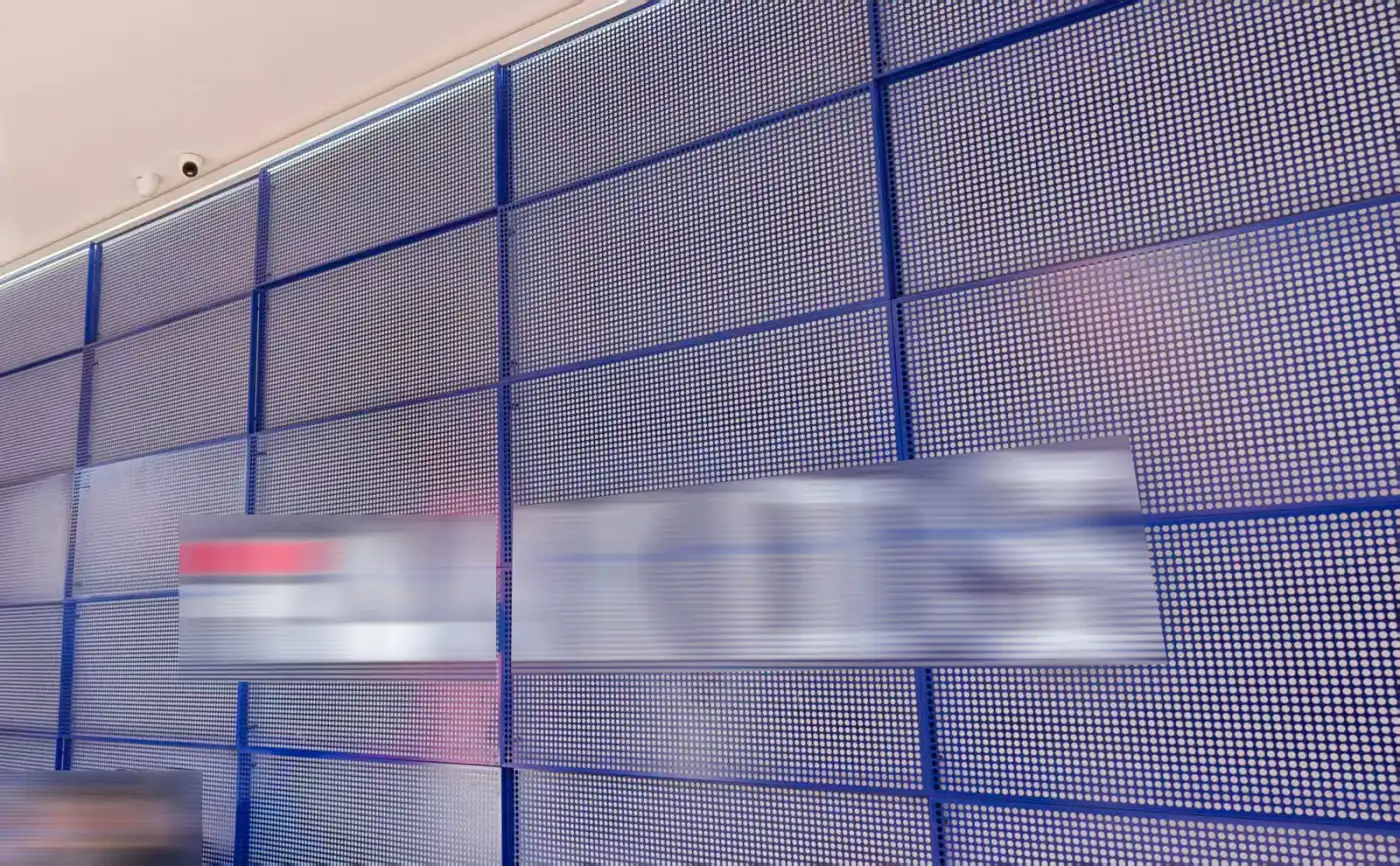 Folded perforated metal panel edge and fixing detail