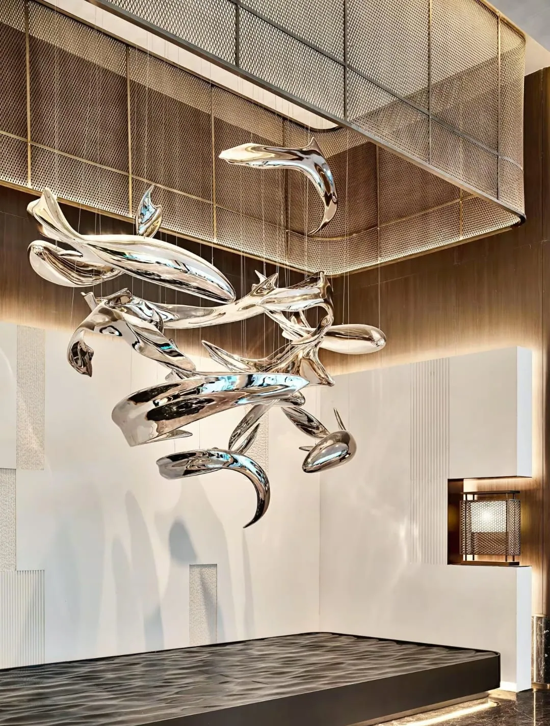 Woven wire mesh used as a warm feature ceiling surface
