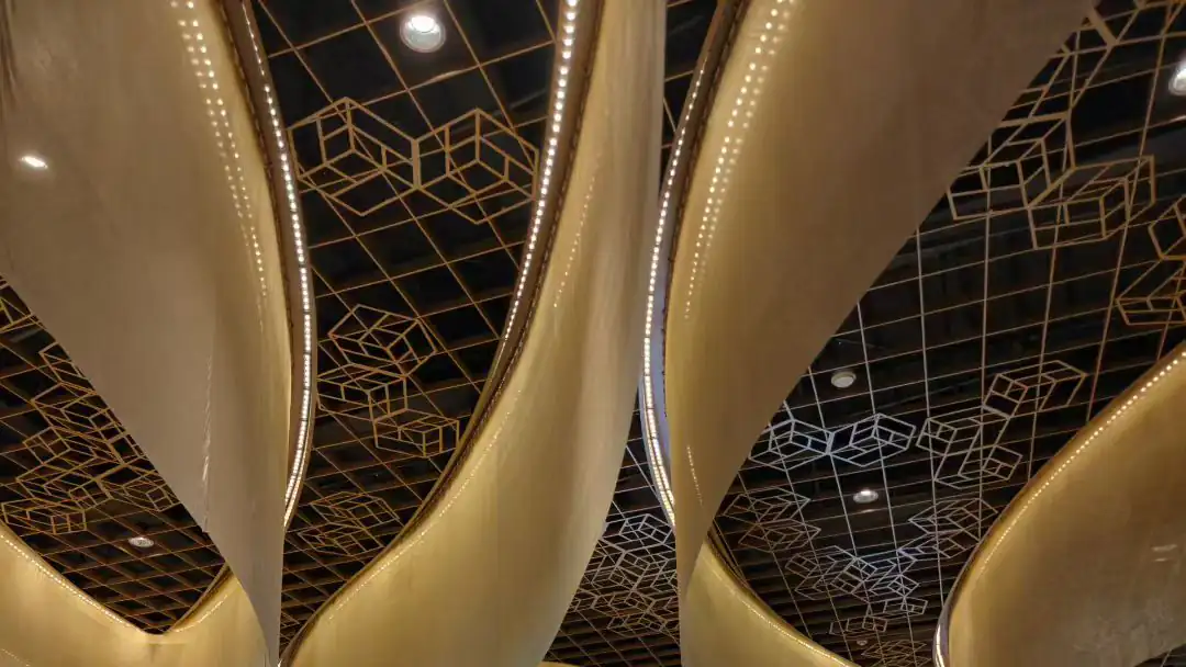 Shopping mall atrium spiral mesh ceiling - Architectural Spiral Mesh